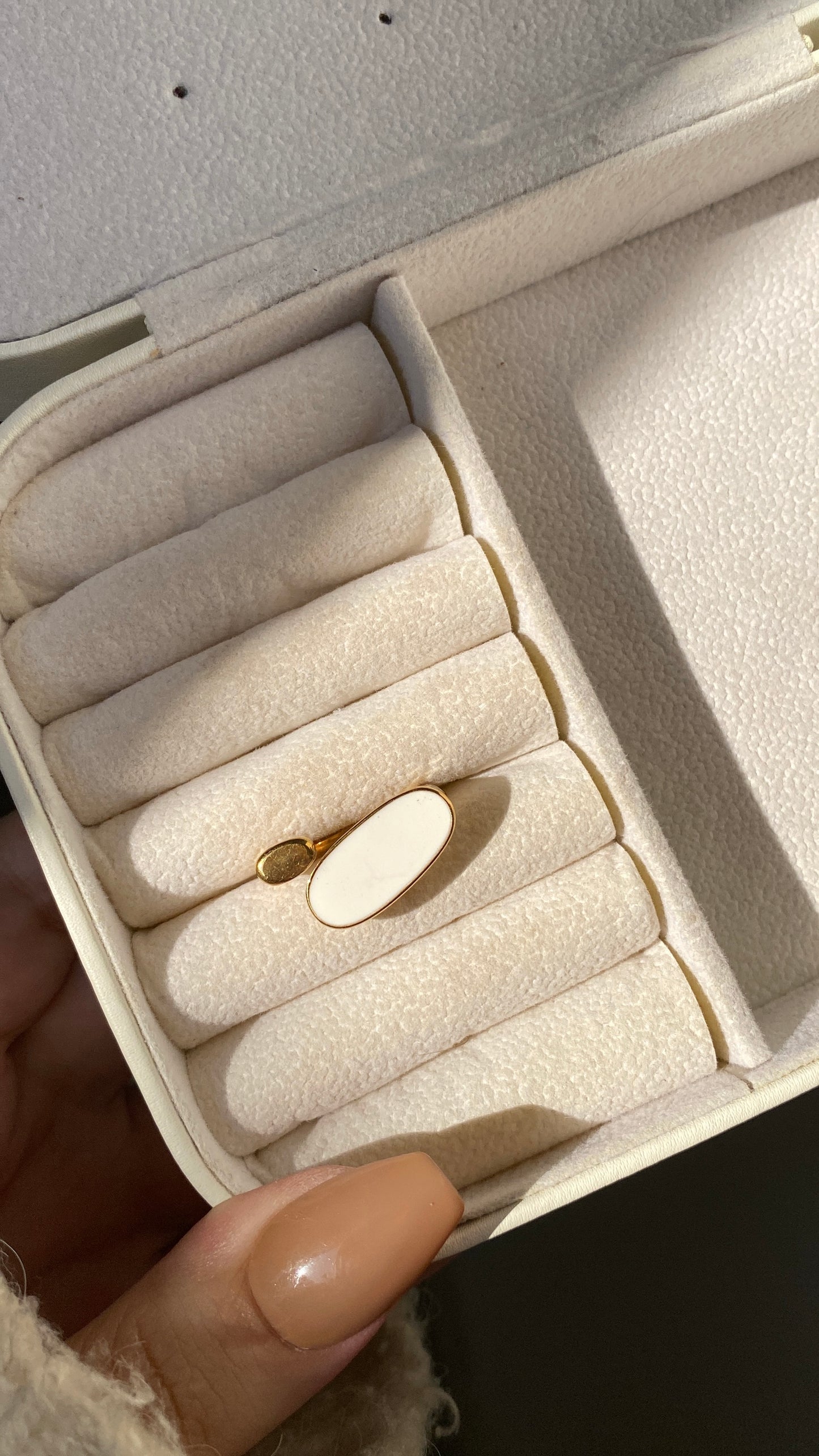 White oval ring
