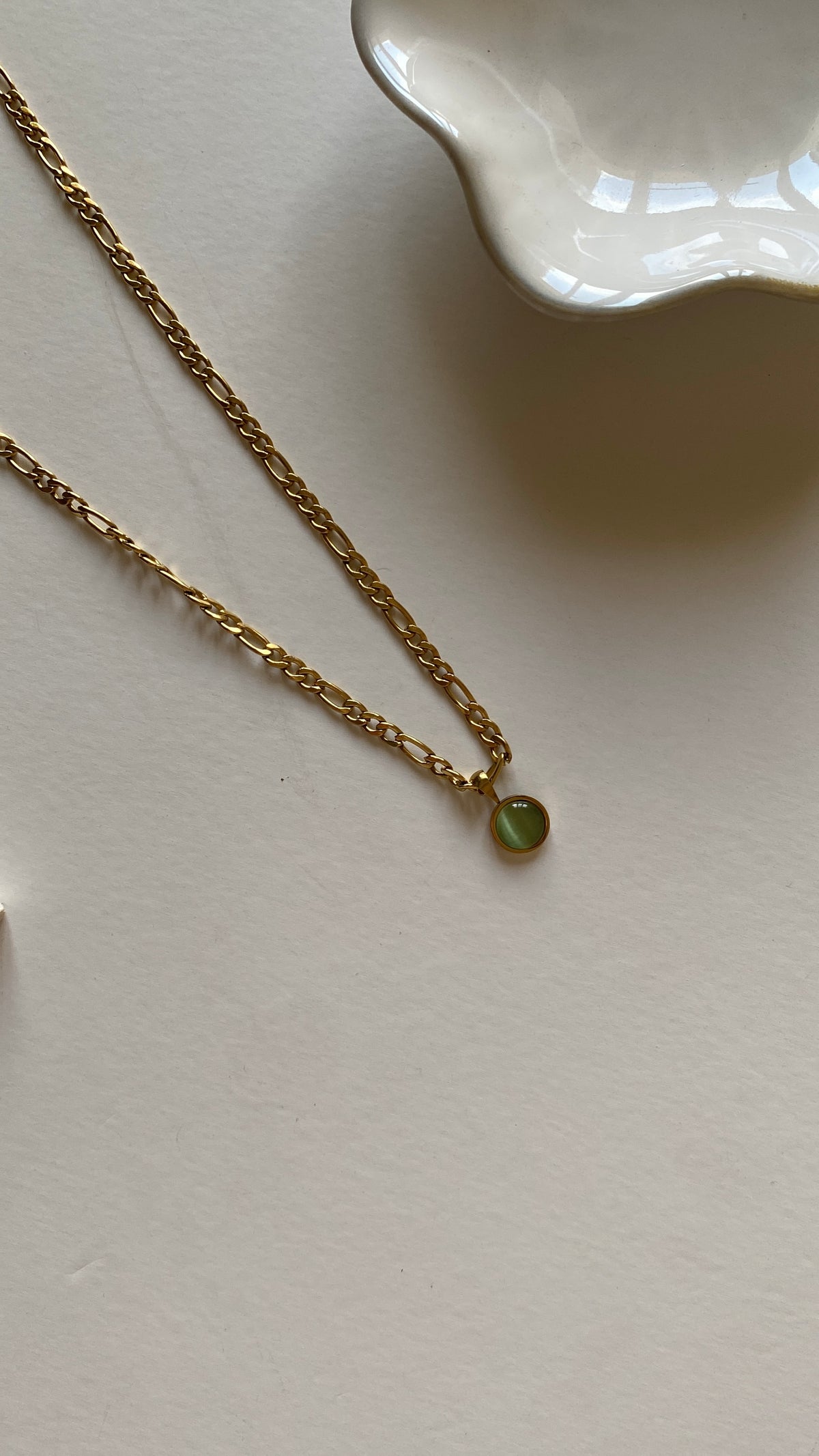 Cartier X light green stone necklace