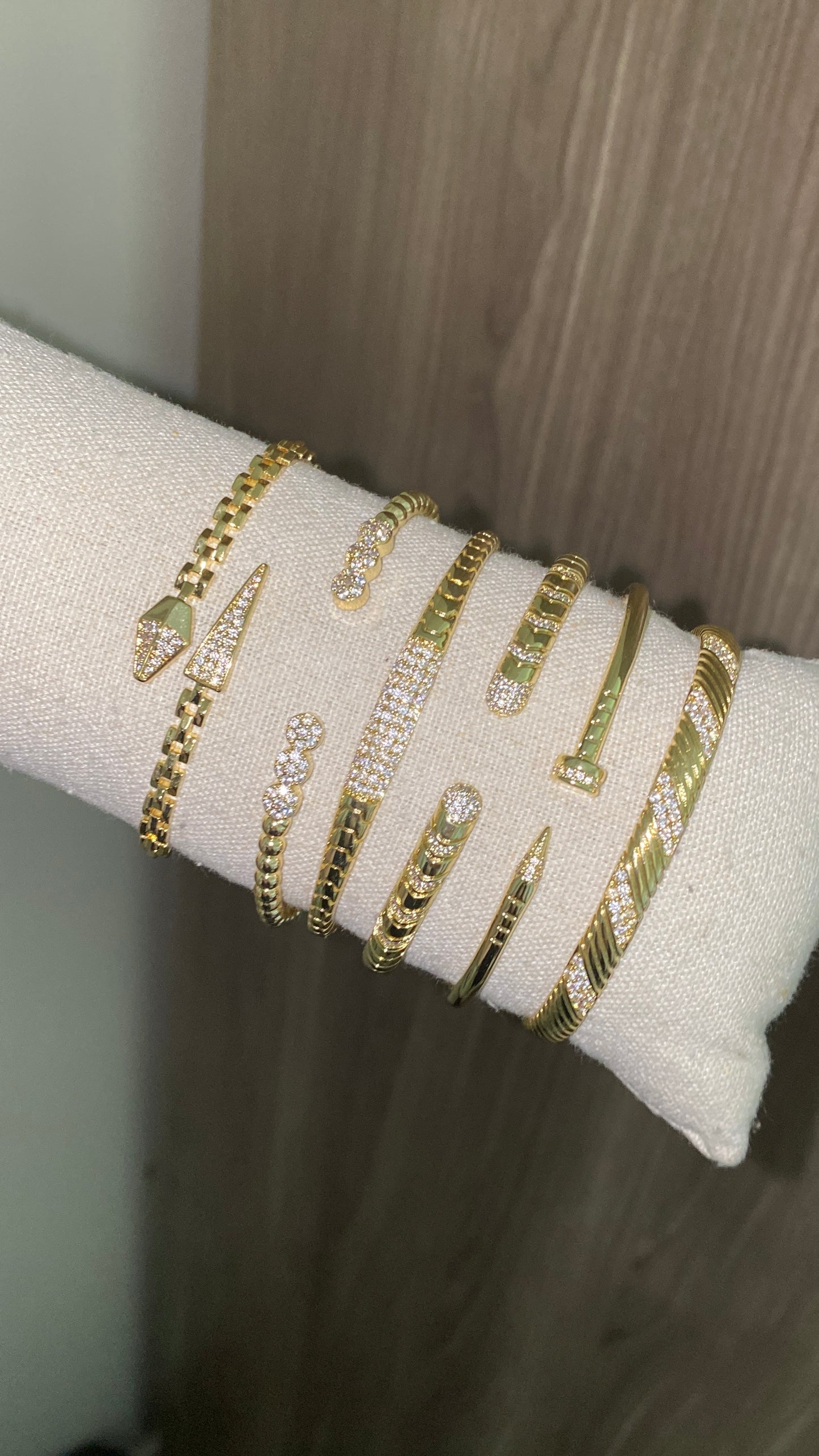 Serpent and nail bangles