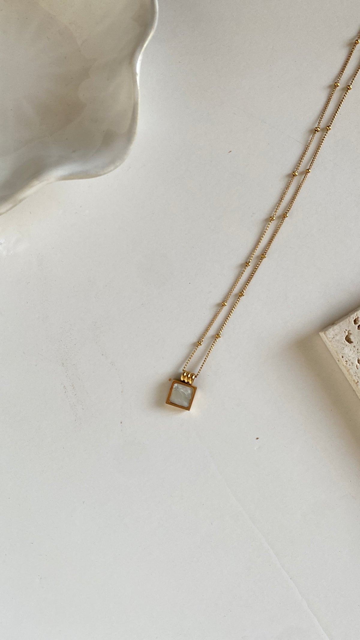 Tiny square necklace