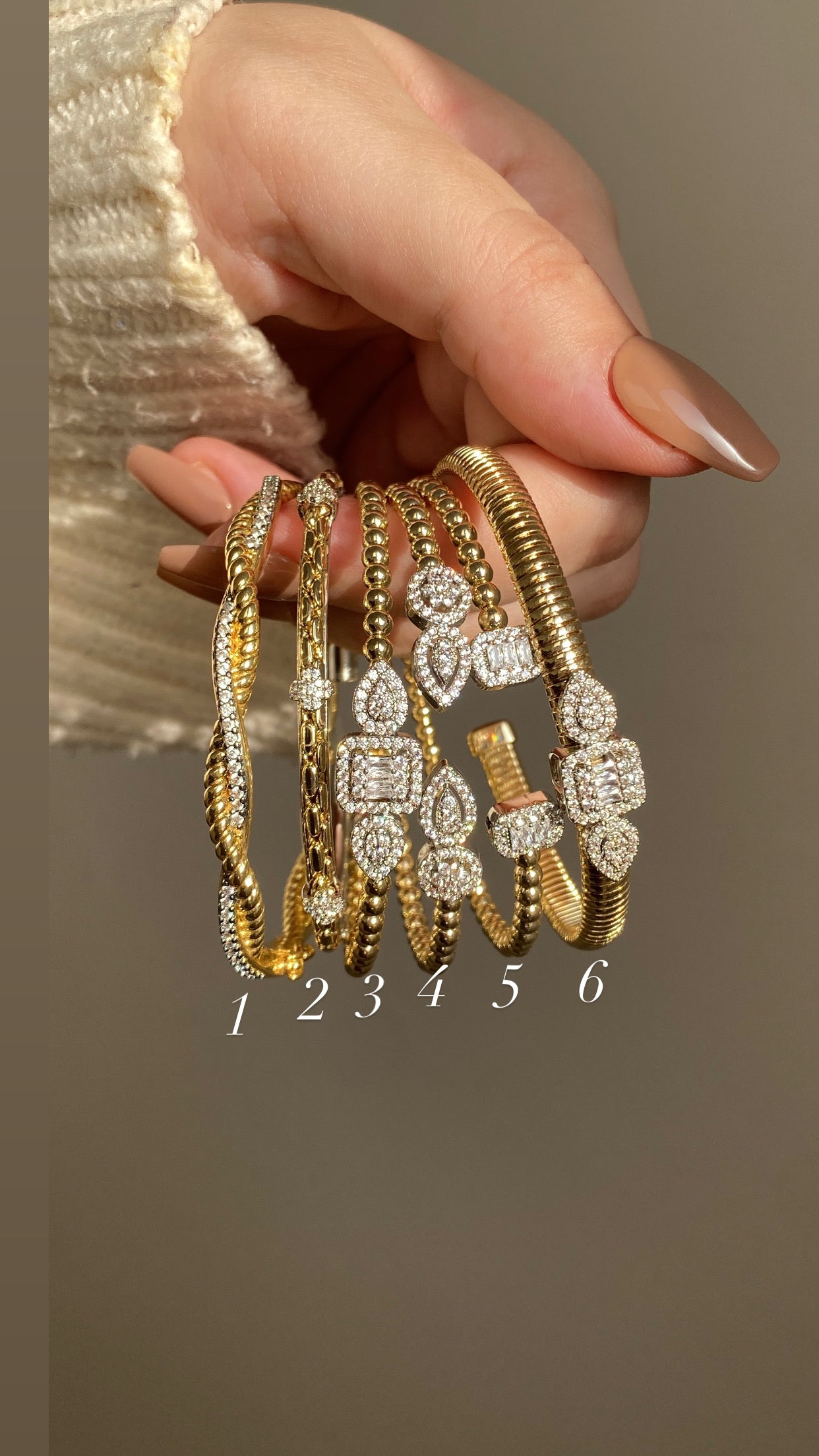 Silver in gold bangles