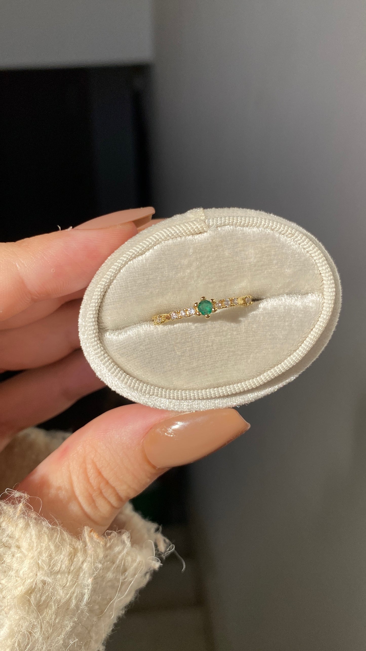 Emerald half tennis ring