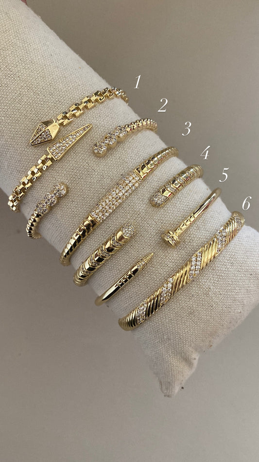 Serpent and nail bangles