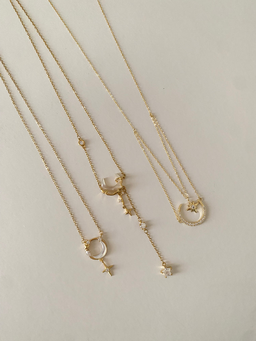 Moon and stars necklaces