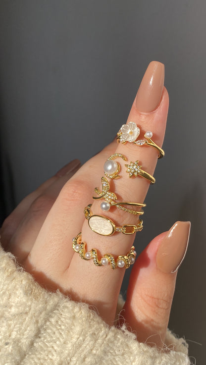 White enamel and pearl rings