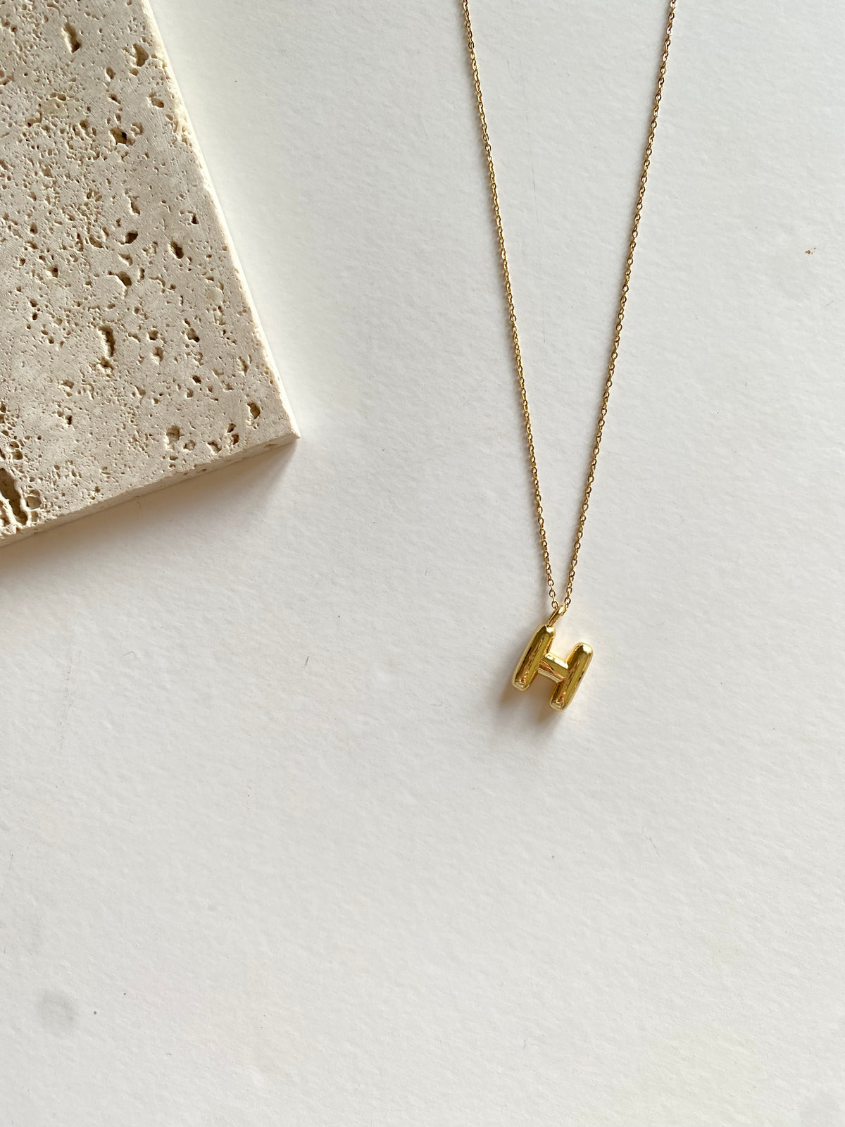 H necklace