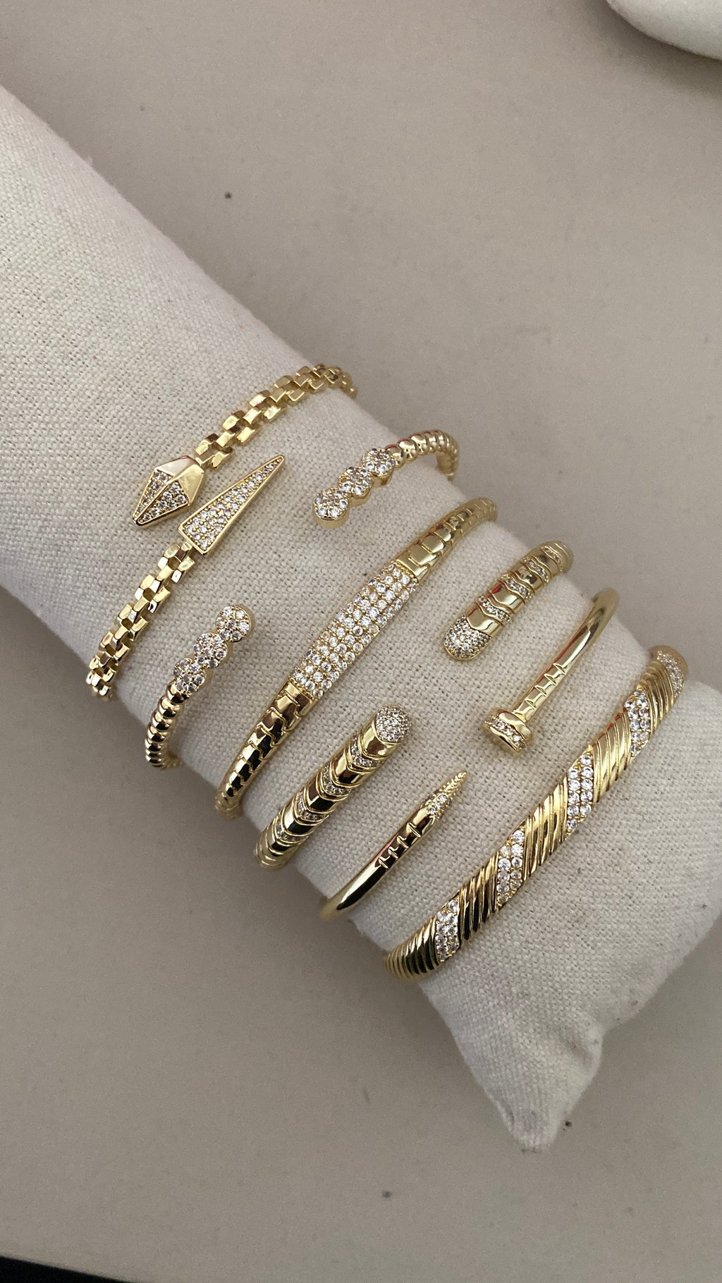 Serpent and nail bangles