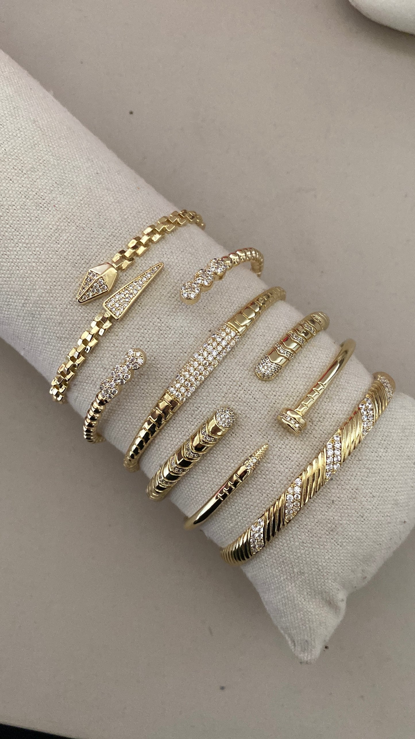 Serpent and nail bangles