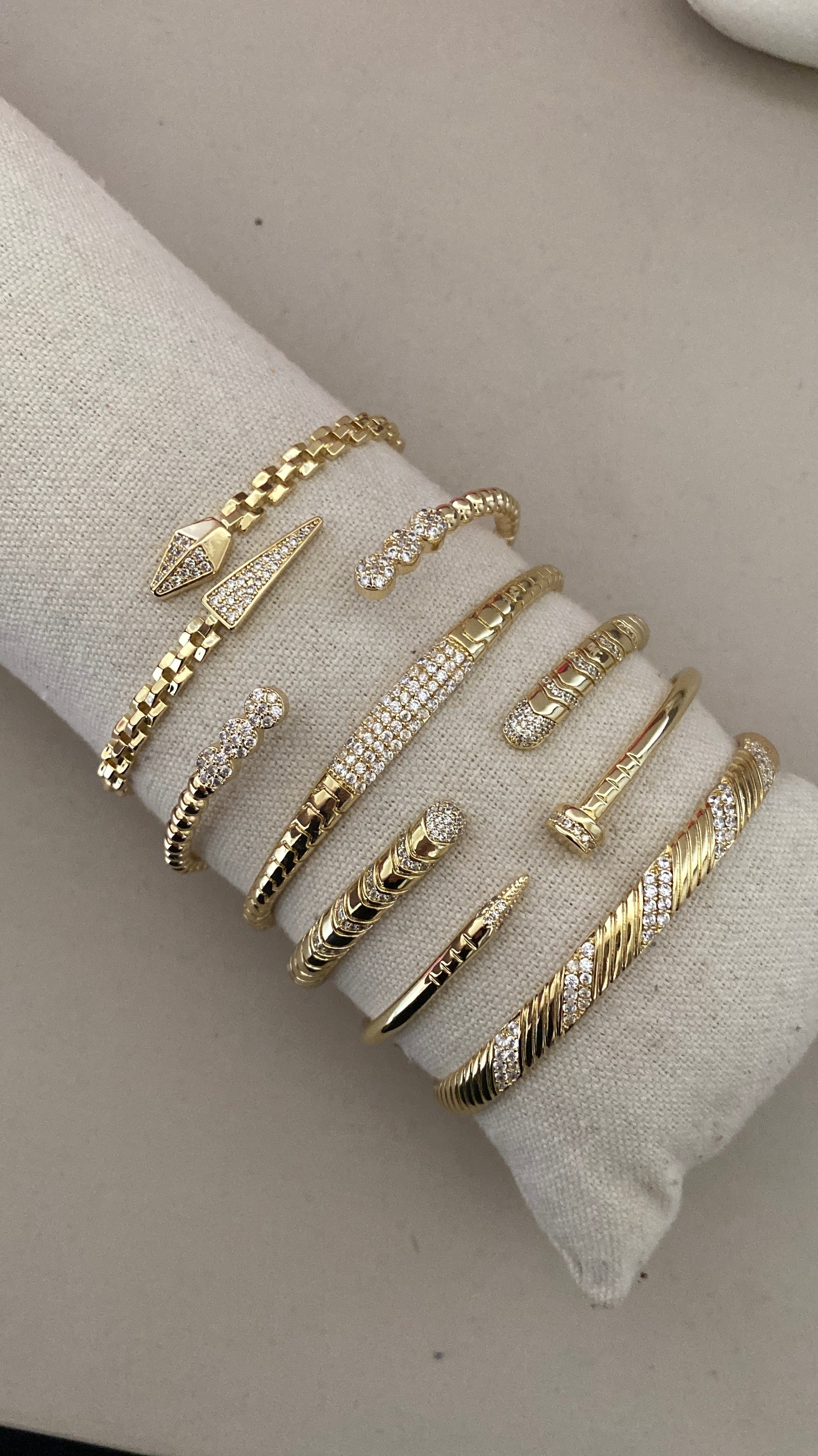 Serpent and nail bangles