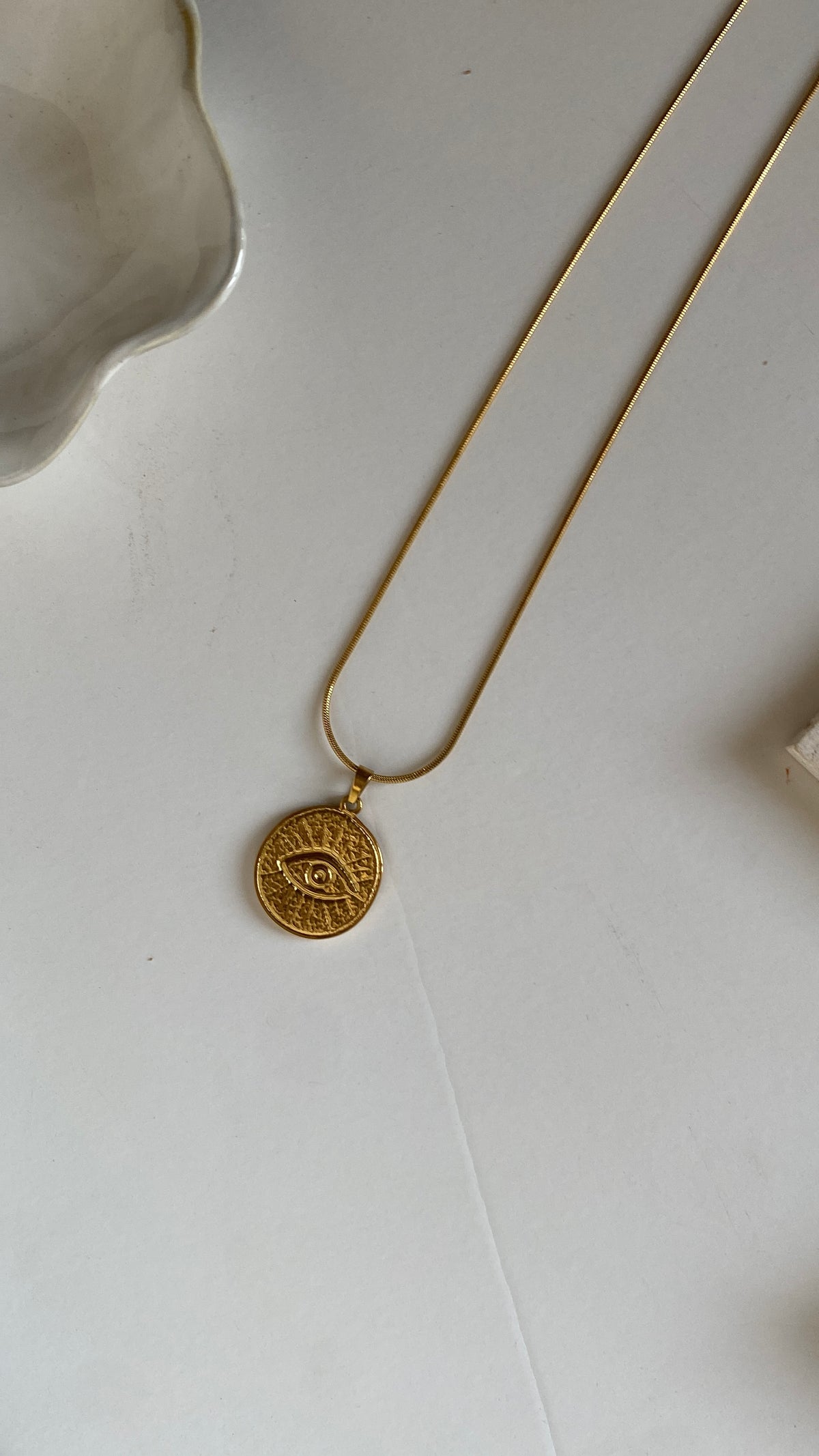 Round evil eye necklace