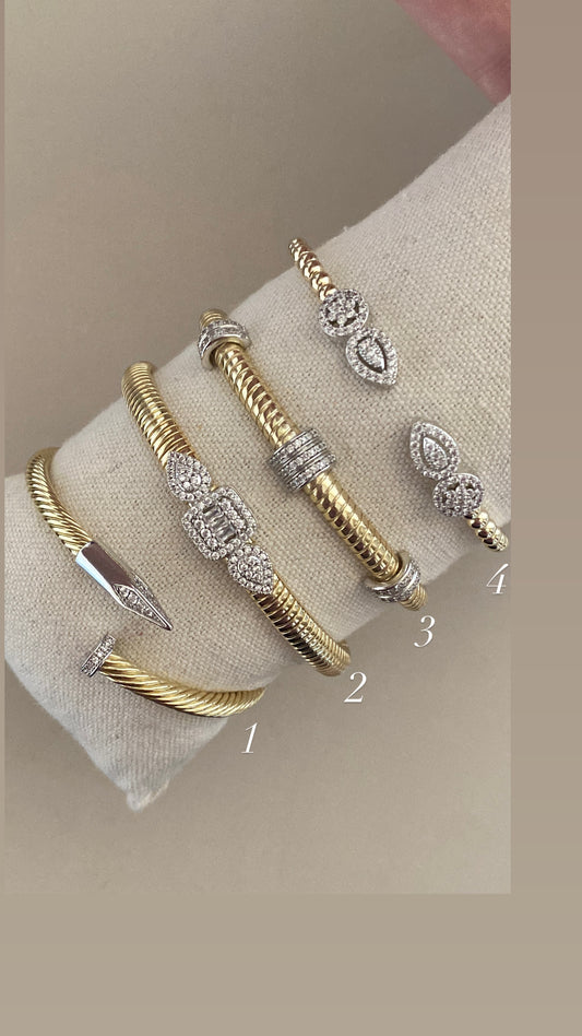 Gold in silver bangle