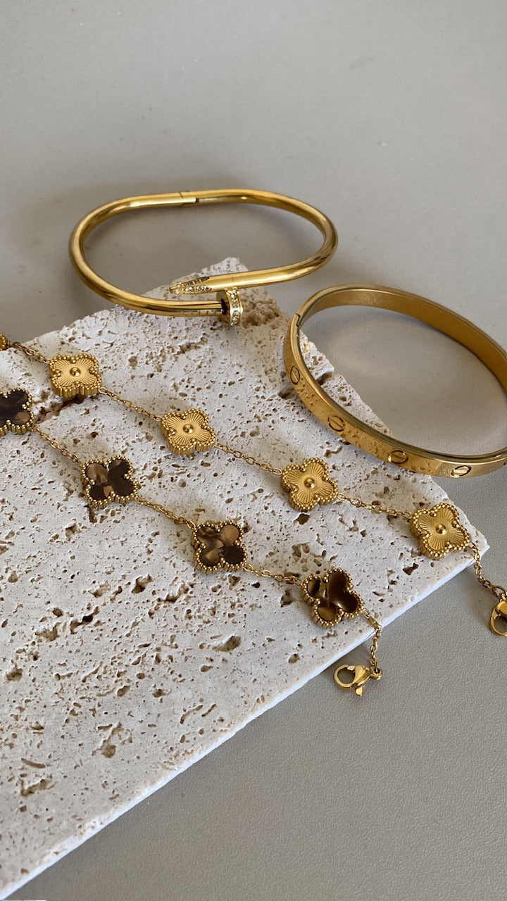 Gold vankleef and cartier