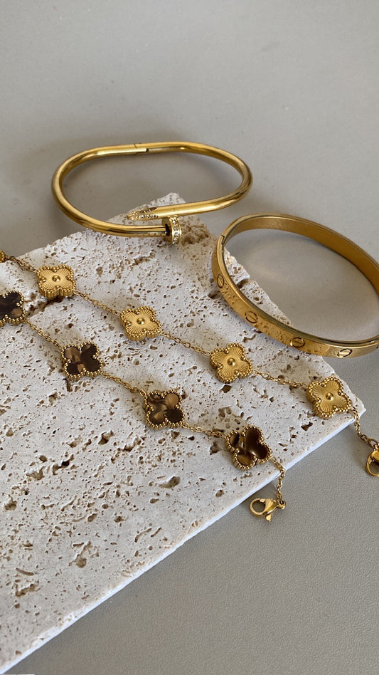 Gold vankleef and cartier