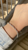 Twisted tennis bracelet