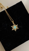 Light blue sun necklace