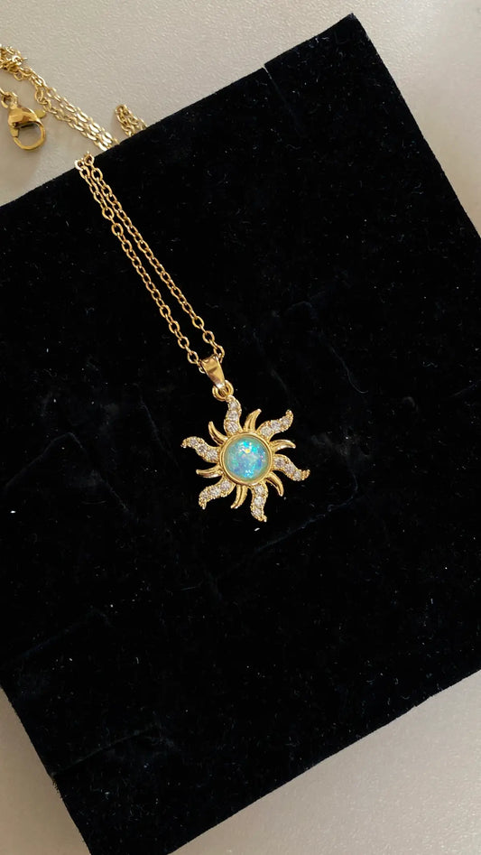 Light blue sun necklace