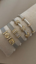 Silver in gold bangles