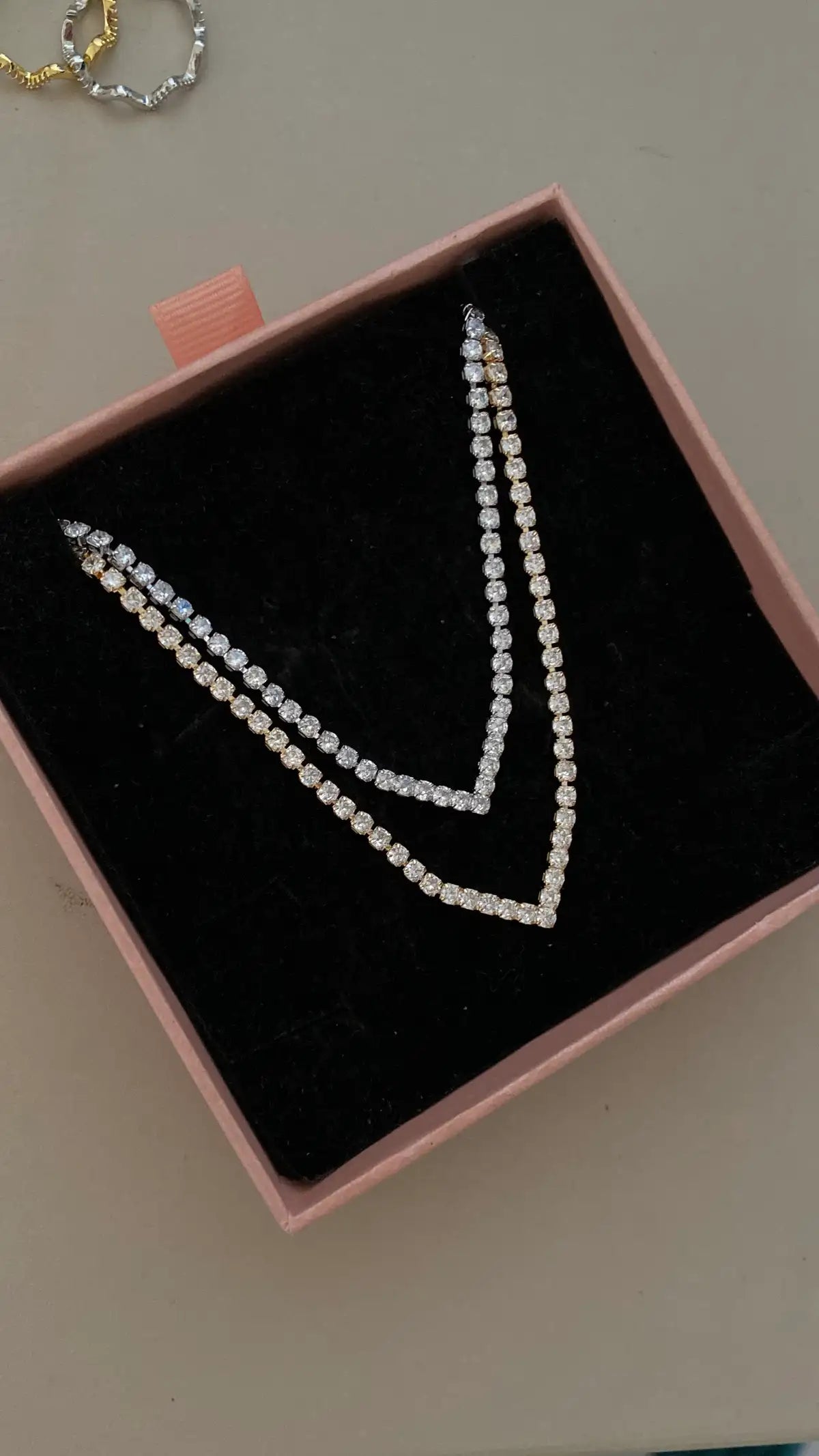 V tennis necklace