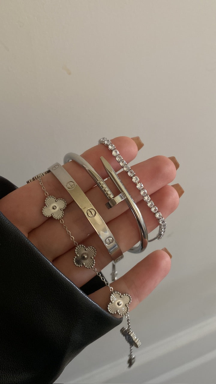 Silver tennis and cartier bangles