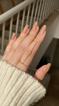 Linked stone ring