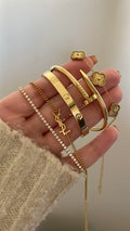 YSL and cartier bracelets