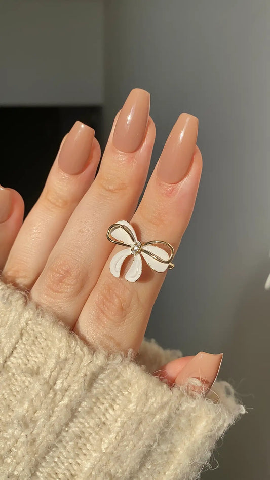 White bow ring