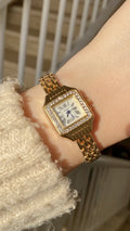 Gold cartier watch