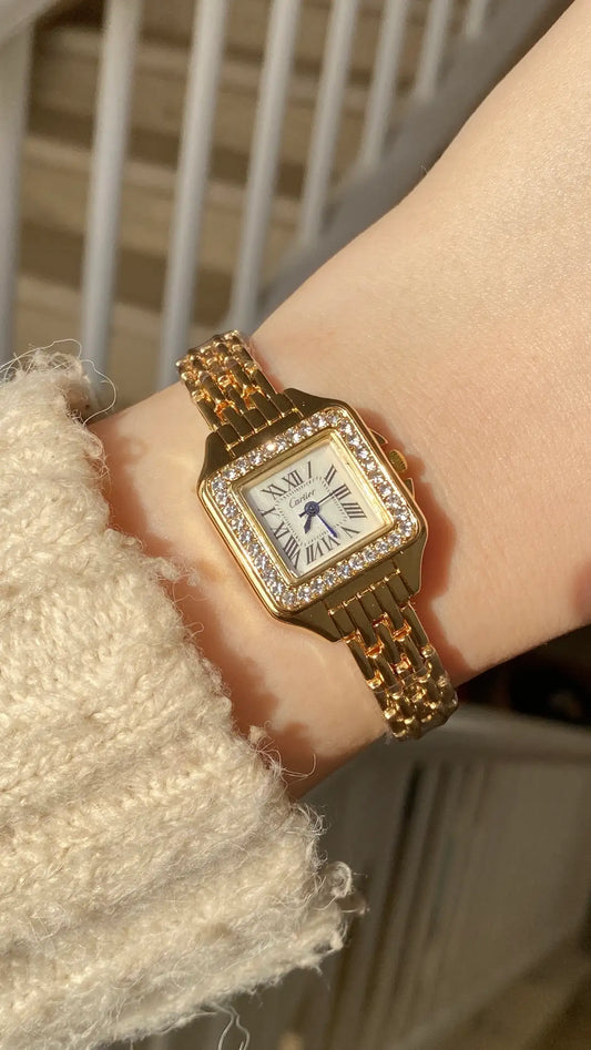 Gold cartier watch