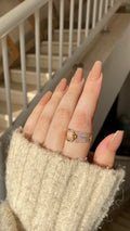 Gold in silver ring