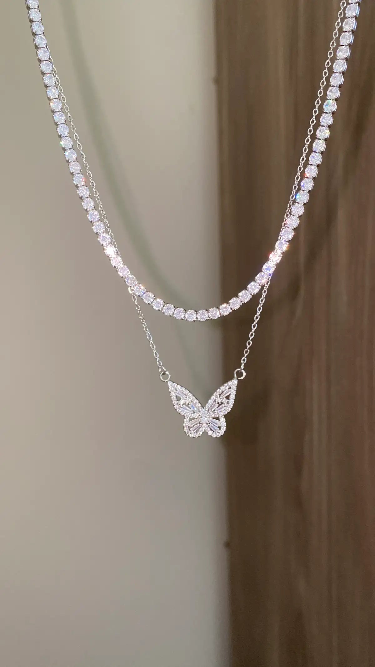 Tennis X butterfly necklace