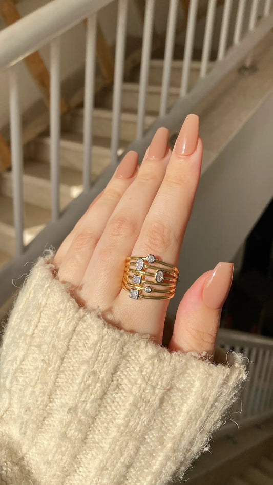 Gold in silver ring